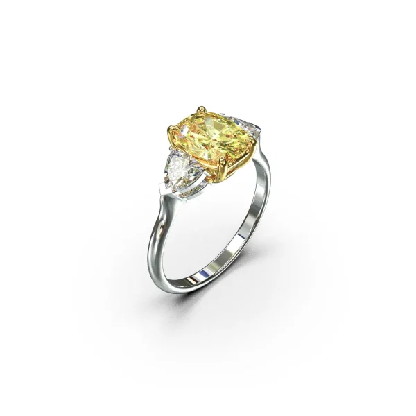 Кольцо Tristone с желтым бриллиантом Fancy Intenese Yellow огранки кушон в окружении двух сиящих бриллиантов огранки "Триллион".